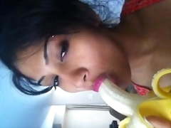 Desi Girl showing how to suck cock with a banana 